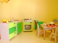 microcreche-les-pitchounes-salle-de-vie-coin-dinette